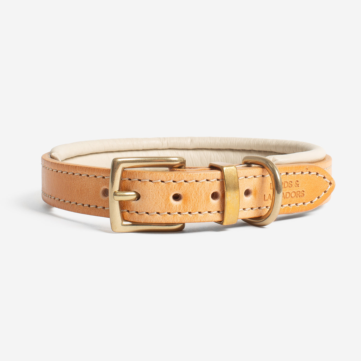 Discover dog walking luxury with our handcrafted Italian padded leather dog collar in Tan & Cream! The perfect collar for dogs available now at Lords & Labradors