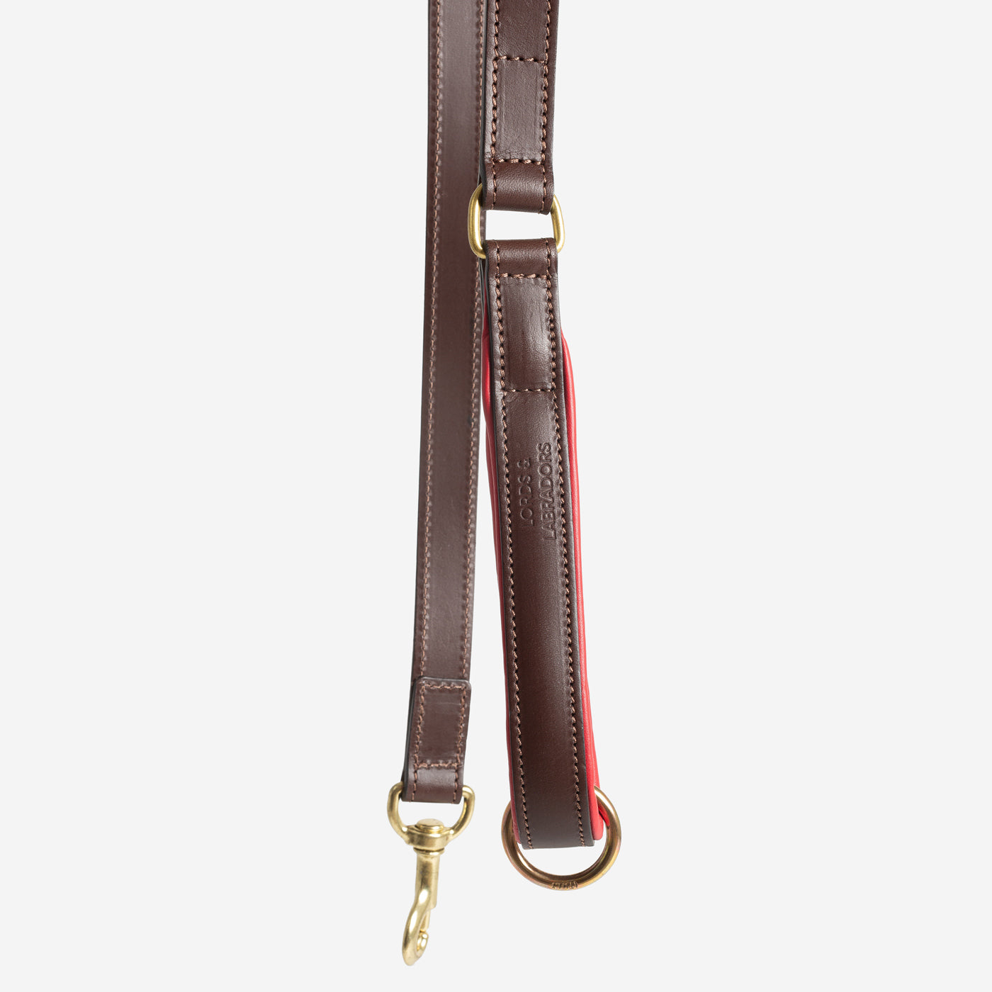 Discover dog walking luxury with our handcrafted Italian padded leather dog Lead in Brown & Red! The perfect Lead for dogs available now at Lords & Labradors
