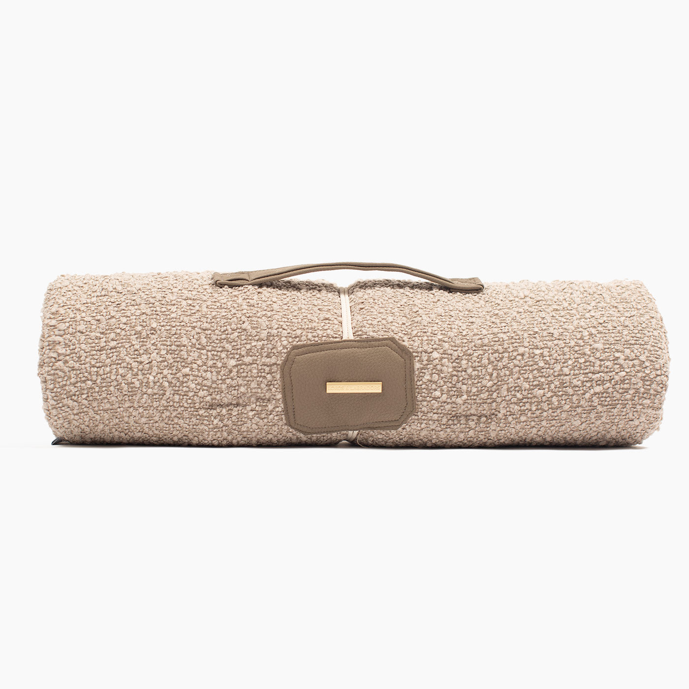 Embark on the perfect pet travel with our luxury Travel Mat in Mink Boucle. Featuring a Carry handle for on the move once Rolled up for easy storage, can be used as a seat cover, boot mat or travel bed! Available now at Lords & Labradors