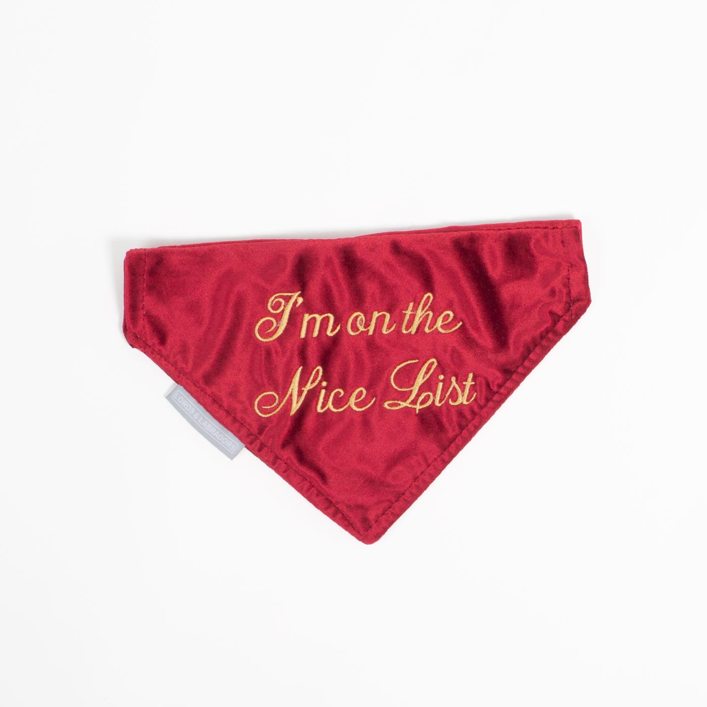 Discover The Perfect Bandana For Dogs, ' I'm on the Nice List ' Dog Bandana In Luxury Cranberry Velvet, Available To Now at Lords & Labradors