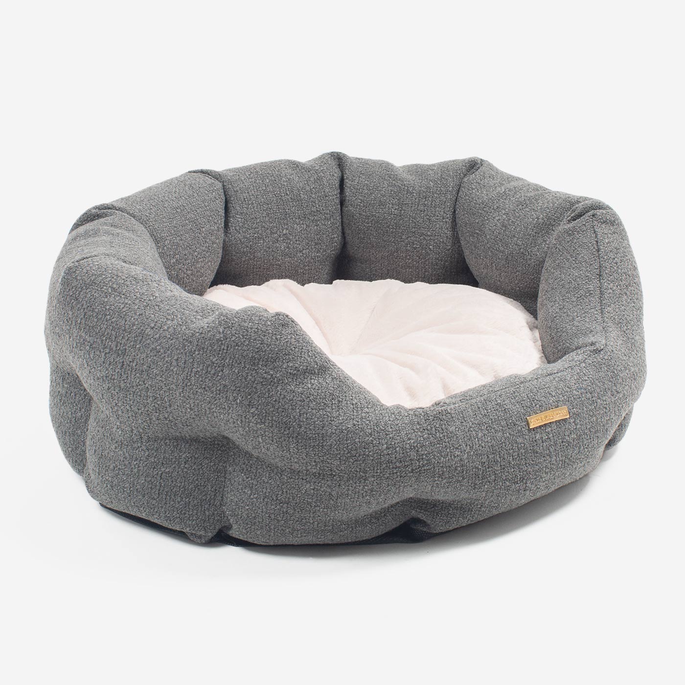 Discover our luxury Herdwick oval dog bed in beautiful graphite, the ideal choice for dogs to enjoy blissful nap-time, featuring reversible inner cushion with raised sides for dogs who love to rest their head for the ultimate cosiness! Handcrafted in Italy for pure pet luxury! Available now at Lords & Labradors