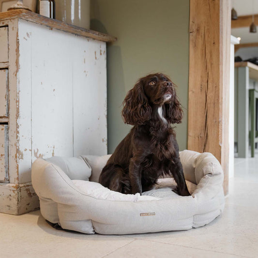 Discover our luxury twill oval dog bed in beautiful Linen, the ideal choice for dogs to enjoy blissful nap-time, featuring reversible inner cushion with raised sides for dogs who love to rest their head for the ultimate cosiness! Handcrafted in Italy for pure pet luxury! Available now at Lords & Labradors 