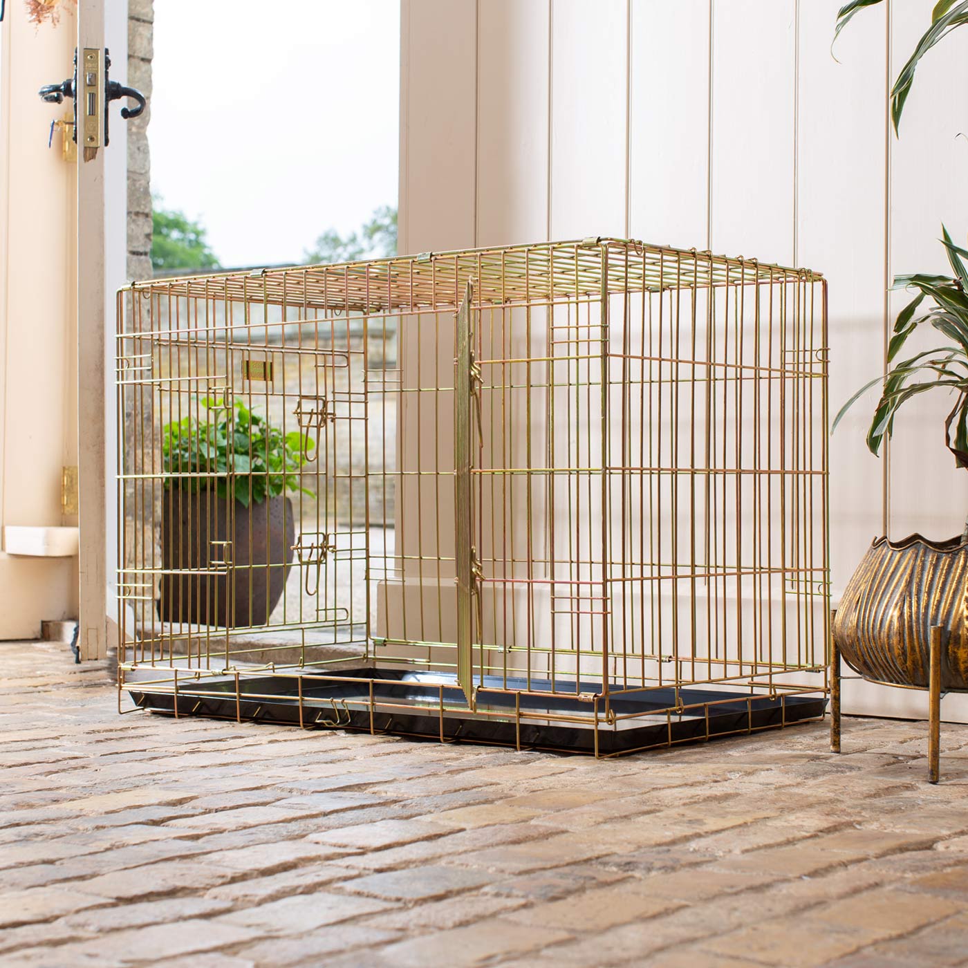 Discover the perfect deluxe heavy duty gold dog crate, featuring two doors for easy access and a removable tray for easy cleaning! The ideal choice to keep new puppies safe, made using pet safe galvanised steel! Available now in 5 sizes and three stunning colours at Lords & Labradors    