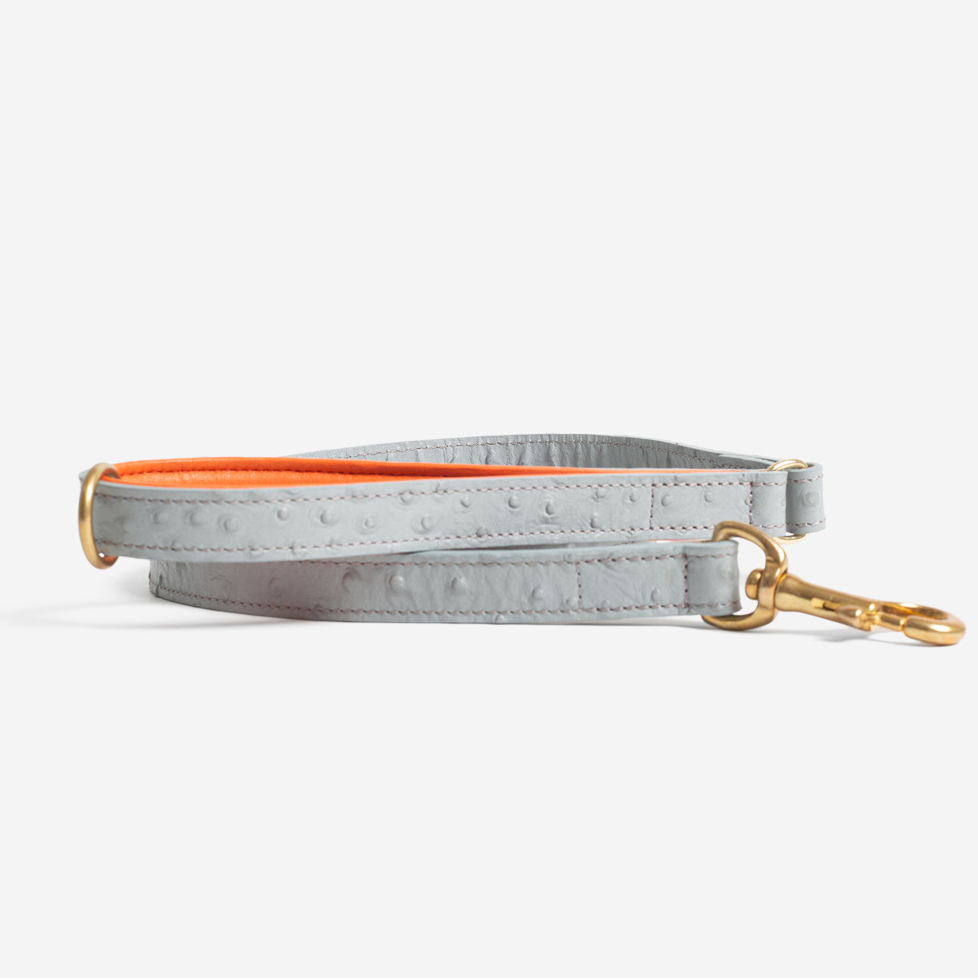 Discover dog walking luxury with our handcrafted Italian Ostrich leather dog Lead in Grey & Orange! The perfect Lead for dogs available now at Lords & Labradors