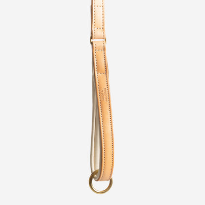 Discover dog walking luxury with our handcrafted Italian padded leather dog Lead in Tan & Cream! The perfect Lead for dogs available now at Lords & Labradors    