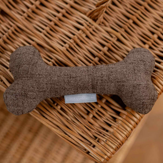 Present the perfect pet play-time with our luxury dog bone toy in stunning Inchmurrin Umber Brown! Available to personalise now at Lords & Labradors, Shop Luxury Dog Toys Online