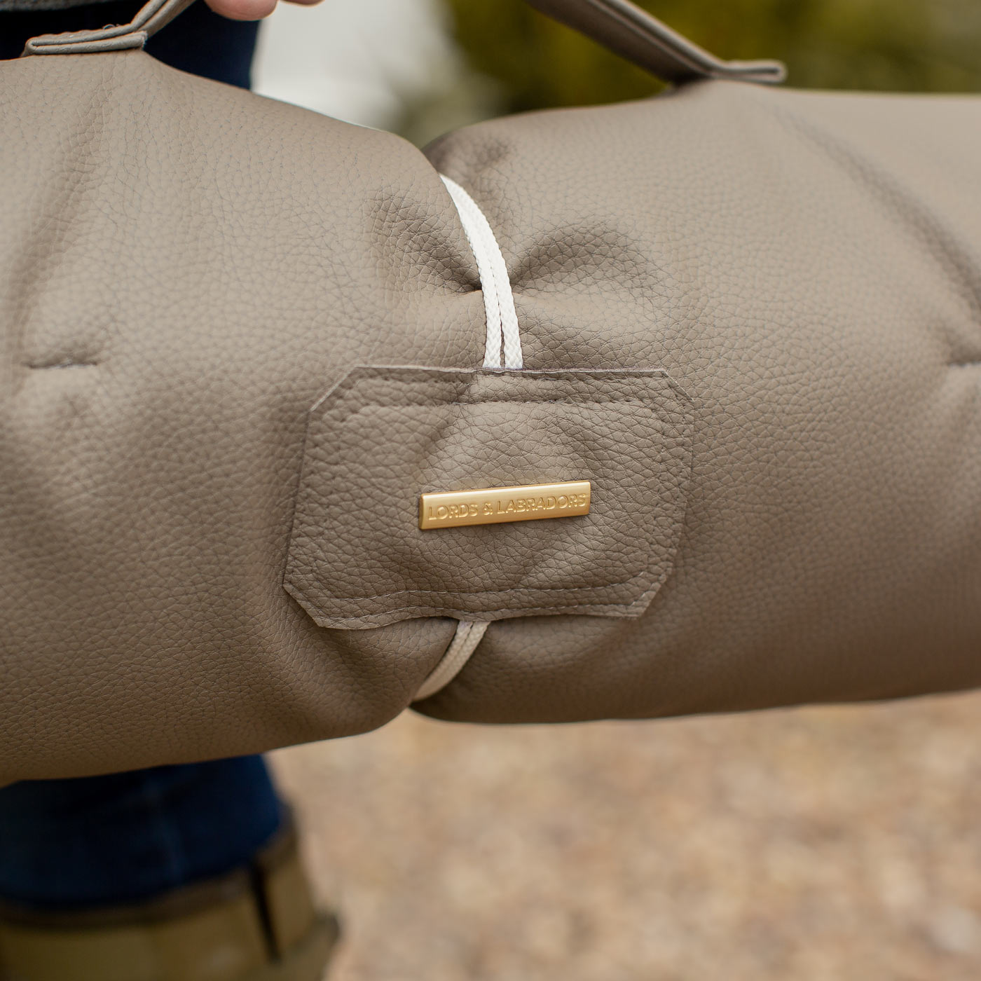 Embark on the perfect pet travel with our luxury Travel Mat in Rhino Camel. Featuring a Carry handle for on the move once Rolled up for easy storage, can be used as a seat cover, boot mat or travel bed! Available now at Lords & Labradors