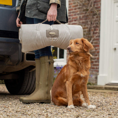 Embark on the perfect pet travel with our luxury Travel Mat in Regency Stripe. Featuring a Carry handle for on the move once Rolled up for easy storage, can be used as a seat cover, boot mat or travel bed! Available now at Lords & Labradors
