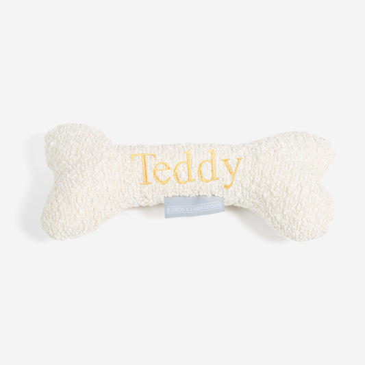 Present The Perfect Pet Playtime With Our Luxury Dog Bone Toy, In Stunning Ivory Bouclé! Available To Personalise Now at Lords & Labradors, Shop Luxury Dog Toys Online    