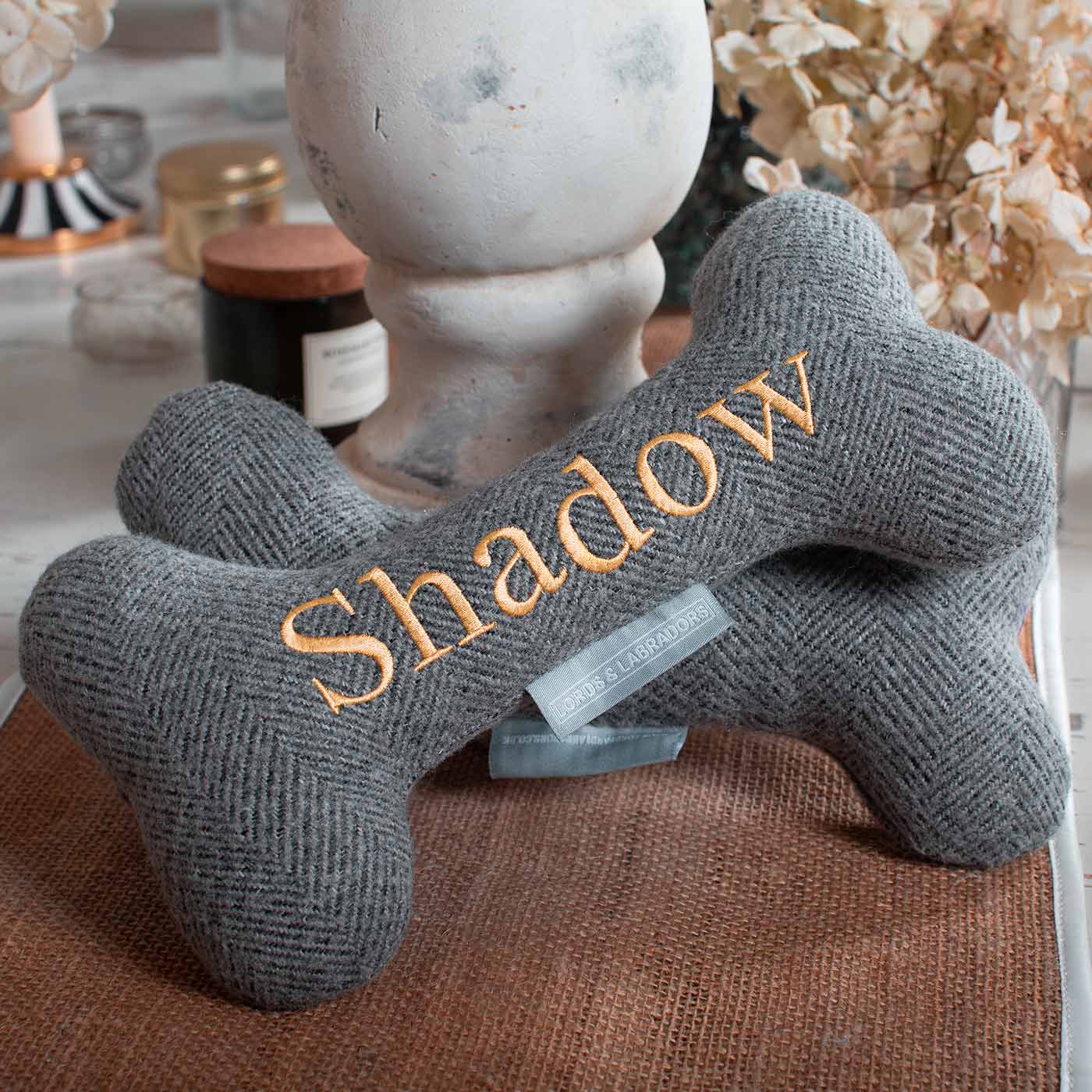Present The Perfect Pet Playtime With Our Luxury Dog Bone Toy, In Stunning Pewter Herringbone Tweed! Available To Personalise Now at Lords & Labradors 