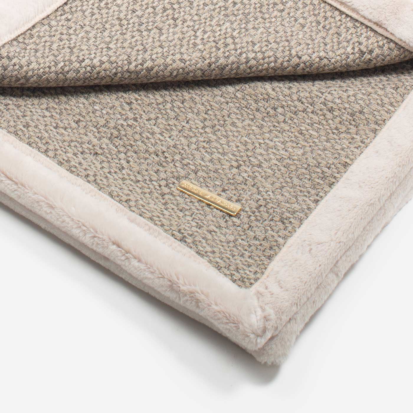 Present your furry friend with our luxuriously thick, plush blanket for your pet. Featuring a reverse side with hardwearing woven fabric handmade in Italy for the perfect high-quality pet blanket! Essentials Herdwick Blanket In Pebble, Available now at Lords & Labradors    