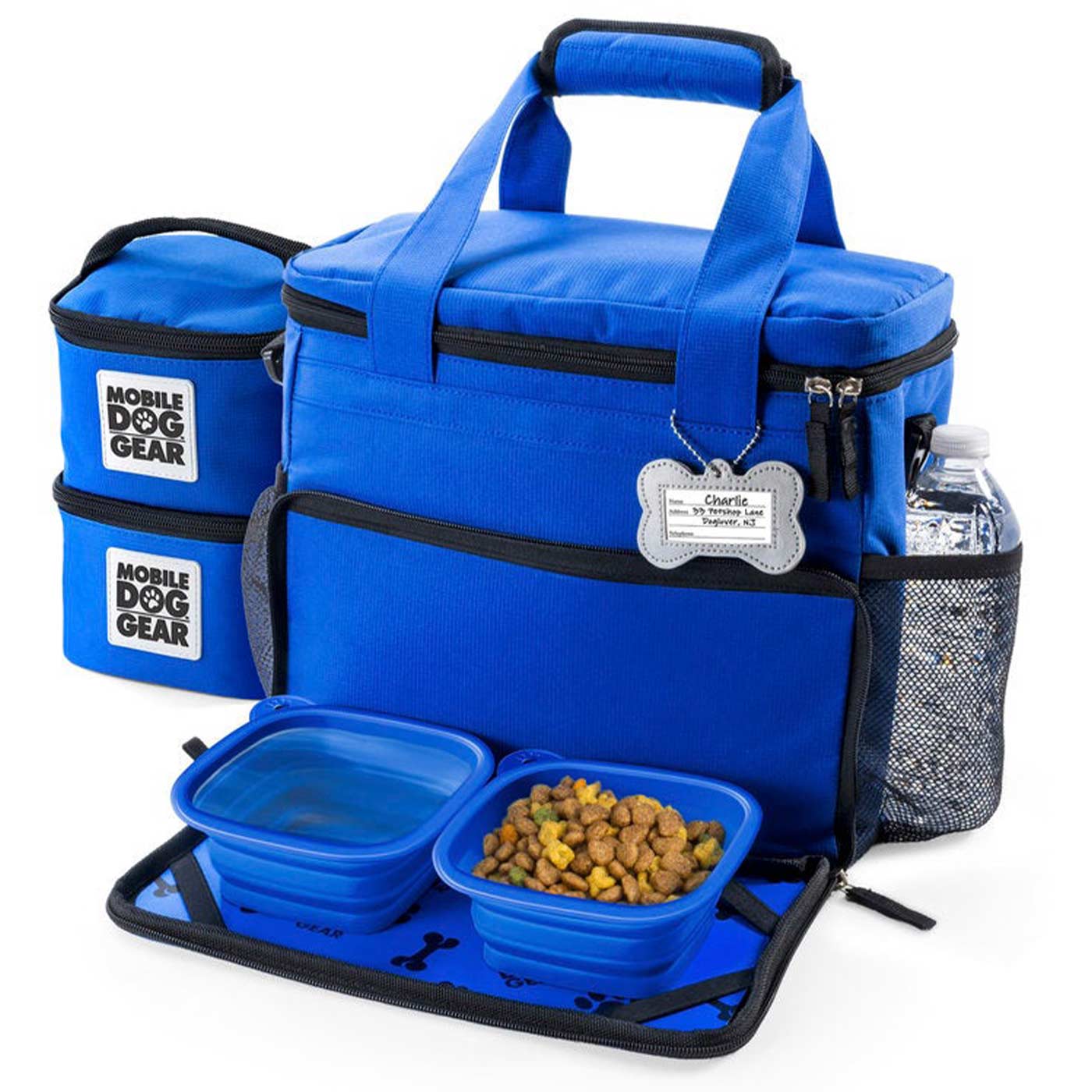 Discover, Mobile Dog Gear Week Away Bag, in Blue. The Perfect Away Bag for any Pet Parent, Featuring dividers to stack food and built in waste bag dispenser. Also Included feeding set, collapsible silicone bowls and placemat! The Perfect Gift For travel, meets airline requirements. Available Now at Lords & Labradors