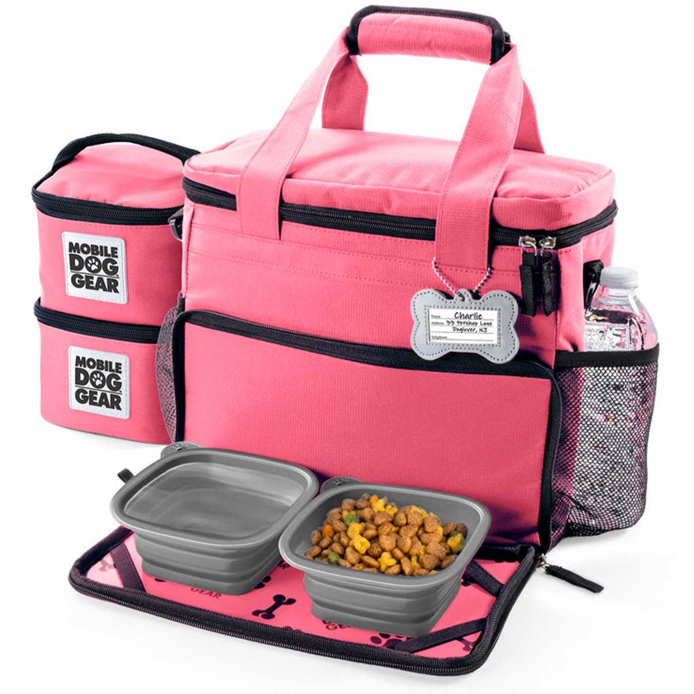 Discover, Mobile Dog Gear Week Away Bag, in Pink. The Perfect Away Bag for any Pet Parent, Featuring dividers to stack food and built in waste bag dispenser. Also Included feeding set, collapsible silicone bowls and placemat! The Perfect Gift For travel, meets airline requirements. Available Now at Lords & Labradors