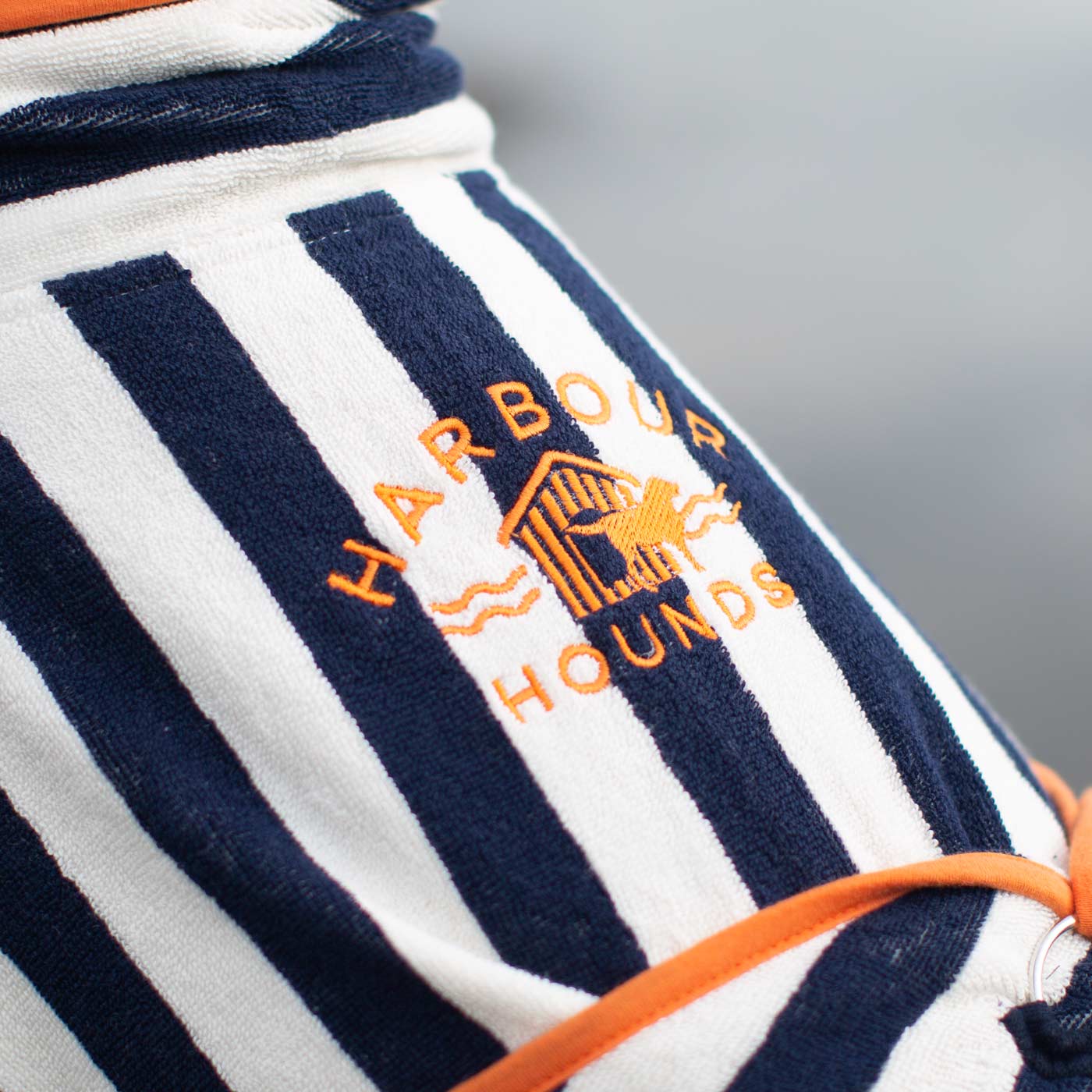 Harbour Hounds blue stripe drying robe embroidered logo close up
