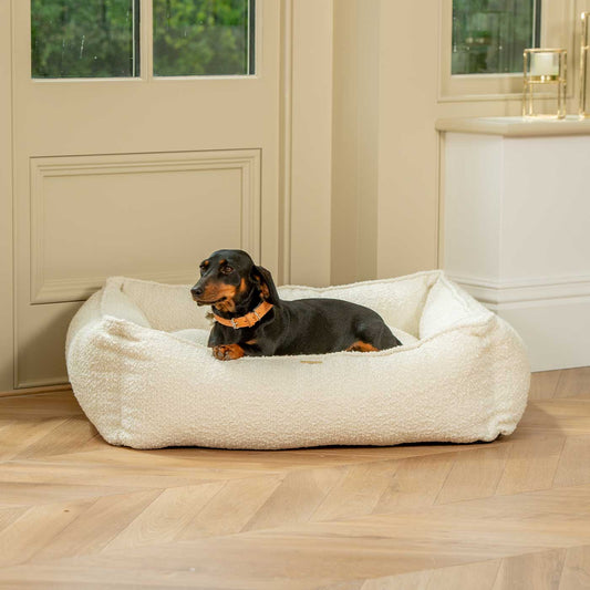 Discover Our Luxurious Handmade Box Bed For Dogs, Featuring an Inner Pillow With Sherpa Fleece On One Side To Craft The Perfect Dog Box Bed In Stunning Ivory Bouclé! Available To Personalise Now at Lords & Labradors    