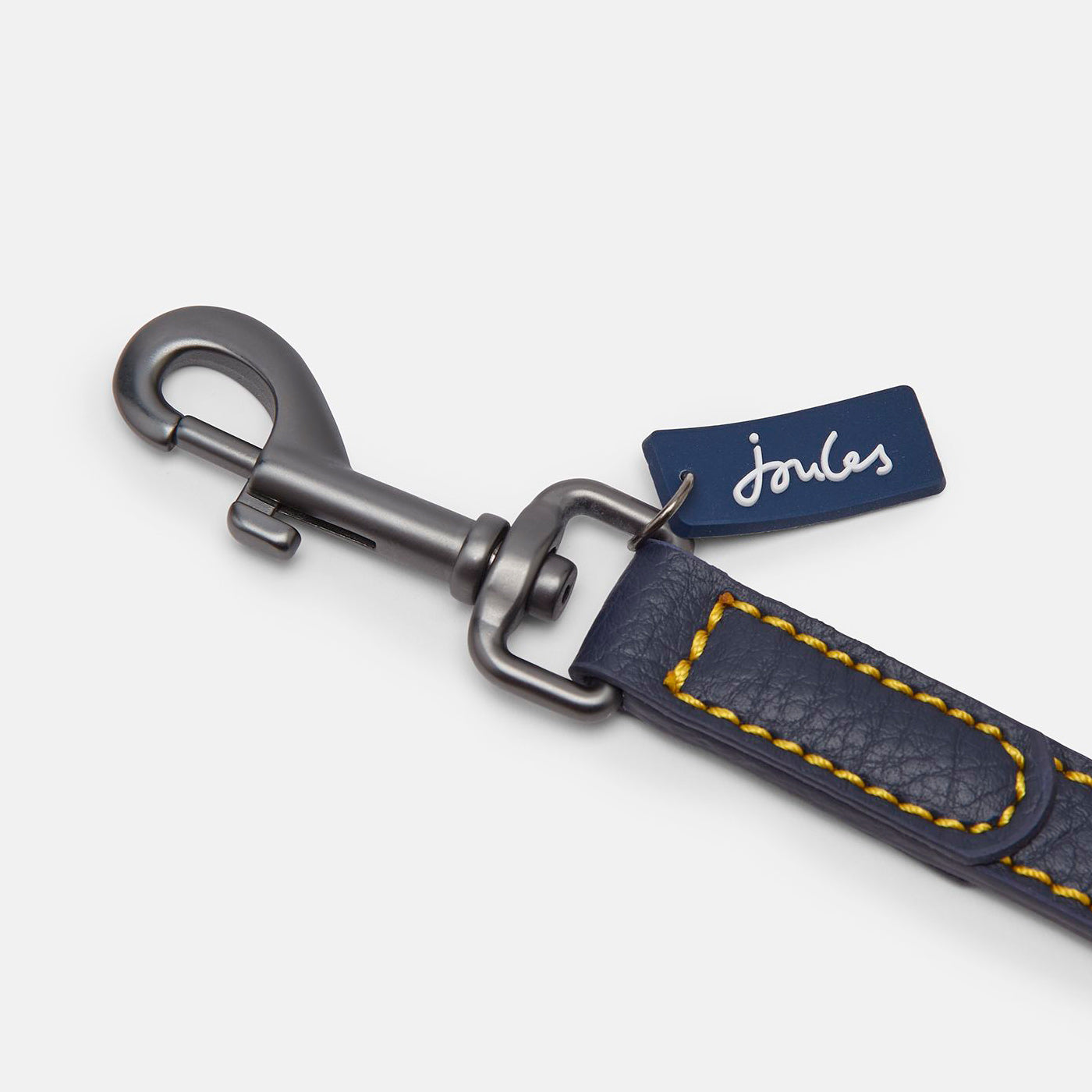 Joules navy leather dog lead close up of clasp in studio