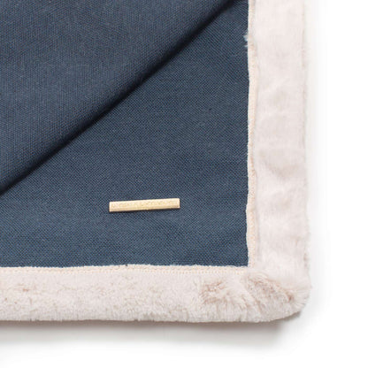 Present your furry friend with our luxuriously thick, plush blanket for your pet. Featuring a reverse side with hardwearing woven fabric handmade in Italy for the perfect high-quality pet blanket! Essentials Twill Blanket In Denim, Available now at Lords & Labradors    