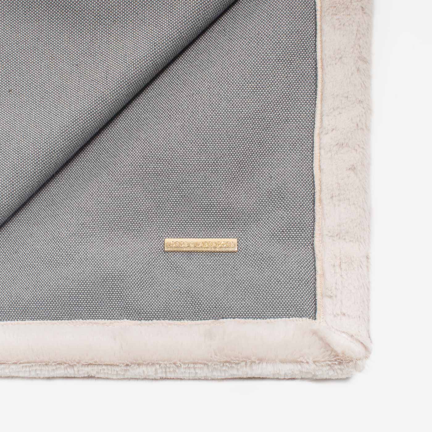 Present your furry friend with our luxuriously thick, plush blanket for your pet. Featuring a reverse side with hardwearing woven fabric handmade in Italy for the perfect high-quality pet blanket! Essentials Twill Blanket In Slate, Available now at Lords & Labradors    