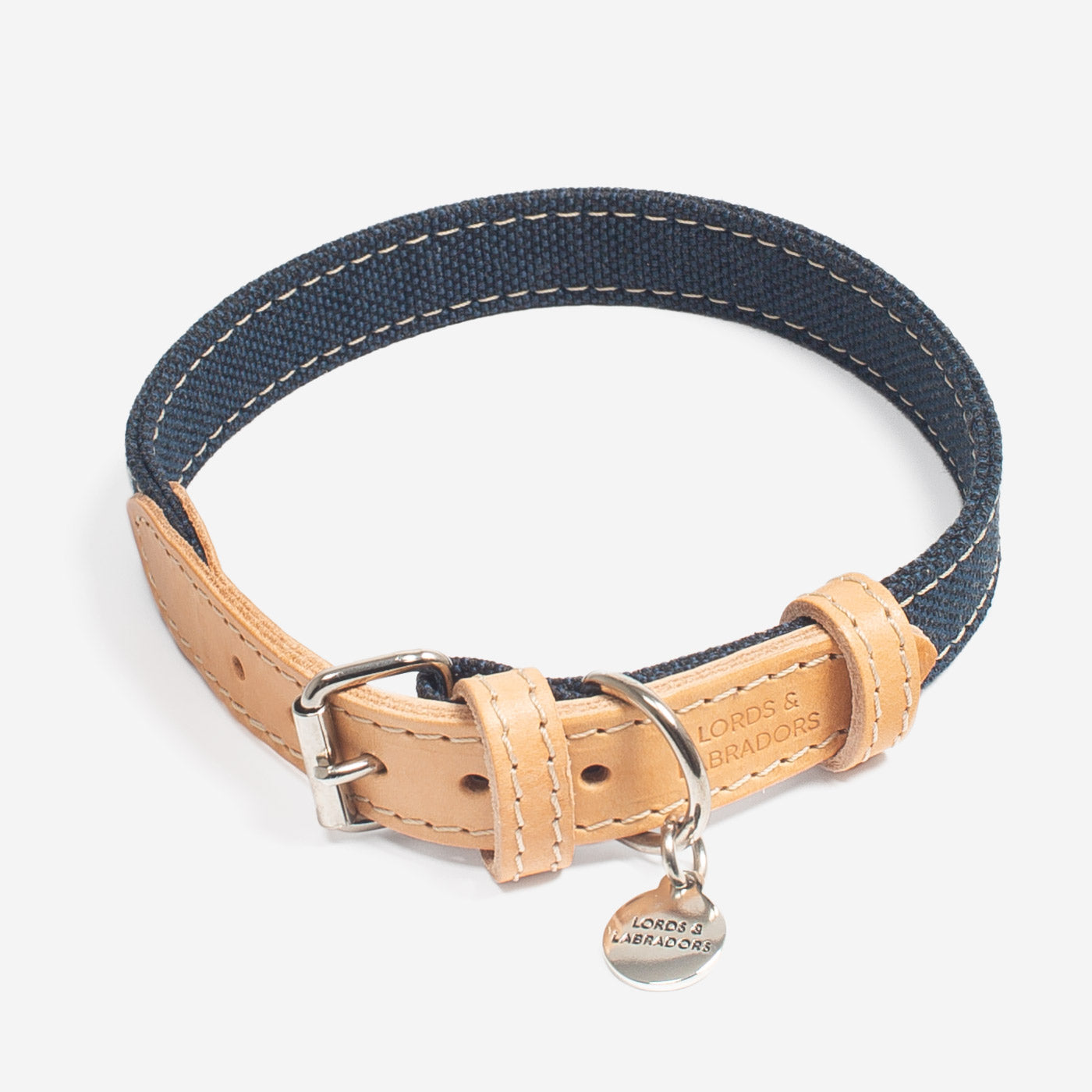 Discover dog walking luxury with our handcrafted Italian dog collar in beautiful essentials twill navy denim with denim blue fabric! The perfect collar for dogs available now at Lords & Labradors    