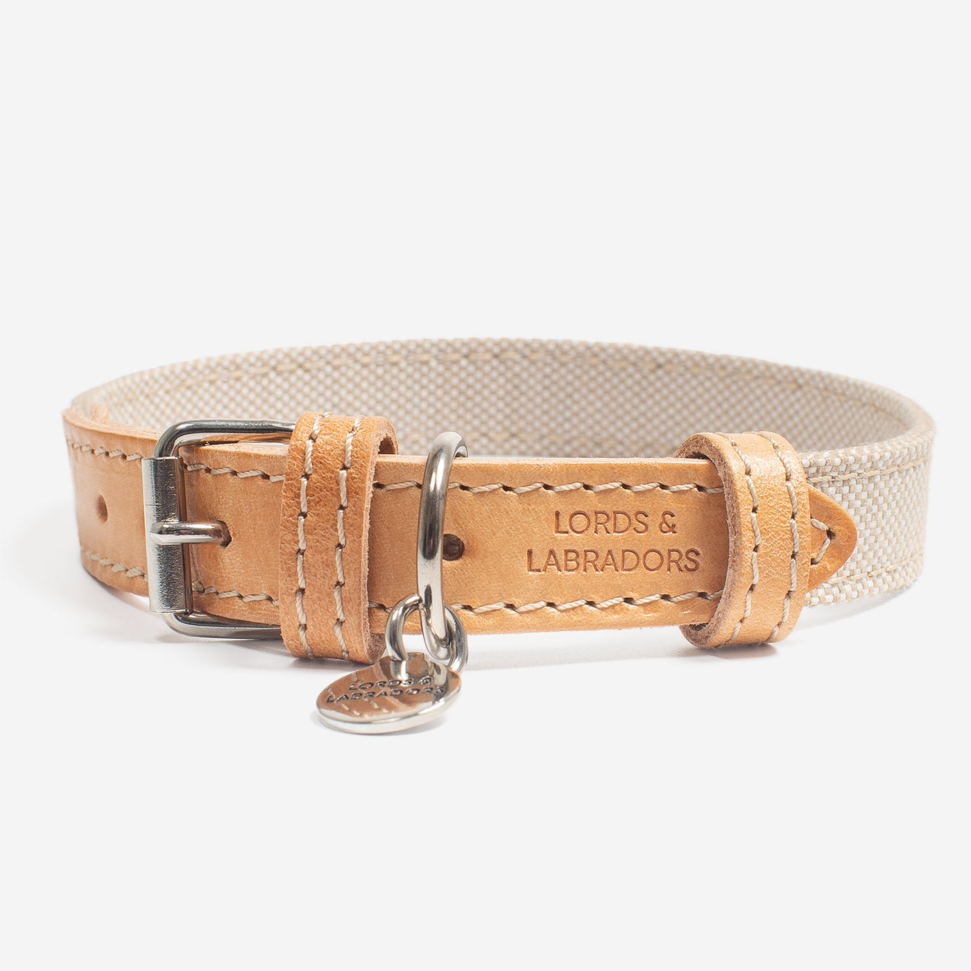 Discover dog walking luxury with our handcrafted Italian dog collar in beautiful essentials twill cream linen with cream fabric! The perfect collar for dogs available now at Lords & Labradors 