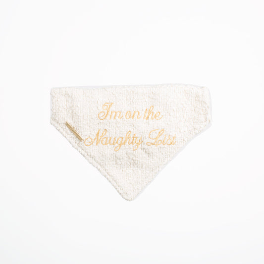 Discover The Perfect Bandana For Dogs, ' I'm on the Naughty List ' Dog Bandana In Luxury Ivory Bouclé, Available To Now at Lords & Labradors    