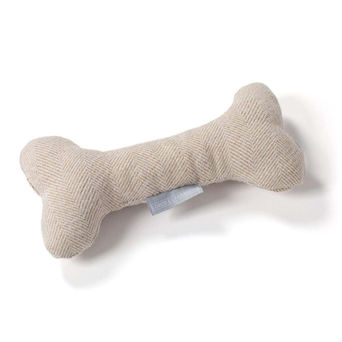 Present The Perfect Pet Playtime With Our Luxury Dog Bone Toy, In Stunning Natural Herringbone Tweed! Available To Personalise Now at Lords & Labradors 