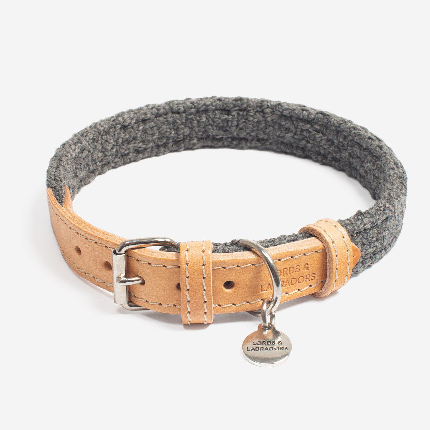 Discover dog walking luxury with our handcrafted Italian dog collar in beautiful graphite with woven dark grey fabric! The perfect collar for dogs available now at Lords & Labradors    