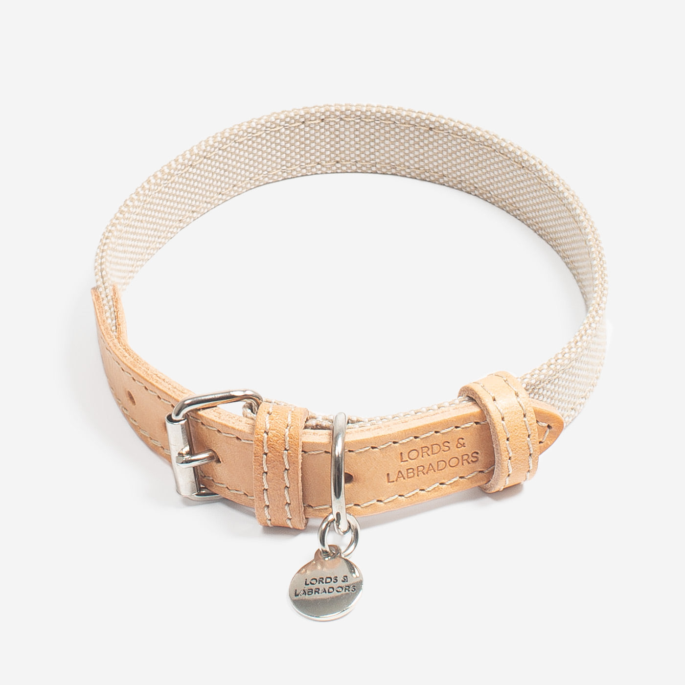 Discover dog walking luxury with our handcrafted Italian dog collar in beautiful essentials twill cream linen with cream fabric! The perfect collar for dogs available now at Lords & Labradors 