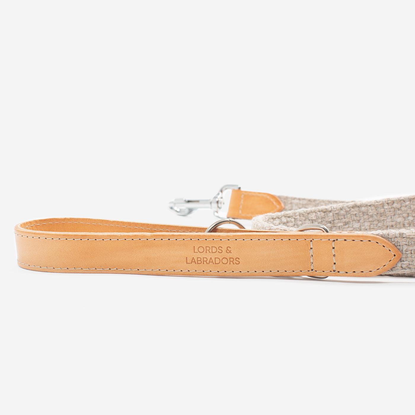 Discover dog walking luxury with our handcrafted Italian Herdwick dog lead in beautiful Sandstone with woven natural sandstone fabric! The perfect lead for dogs available now at Lords & Labradors    