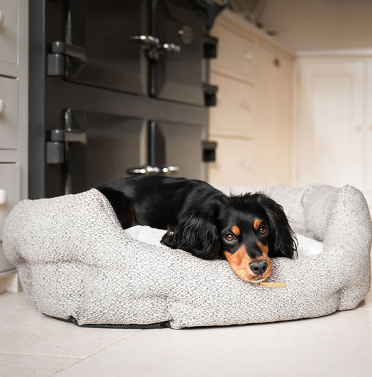 Discover our luxury Herdwick oval dog bed in beautiful pebble, the ideal choice for dogs to enjoy blissful nap-time, featuring reversible inner cushion with raised sides for dogs who love to rest their head for the ultimate cosiness! Handcrafted in Italy for pure pet luxury! Available now at Lords & Labradors 