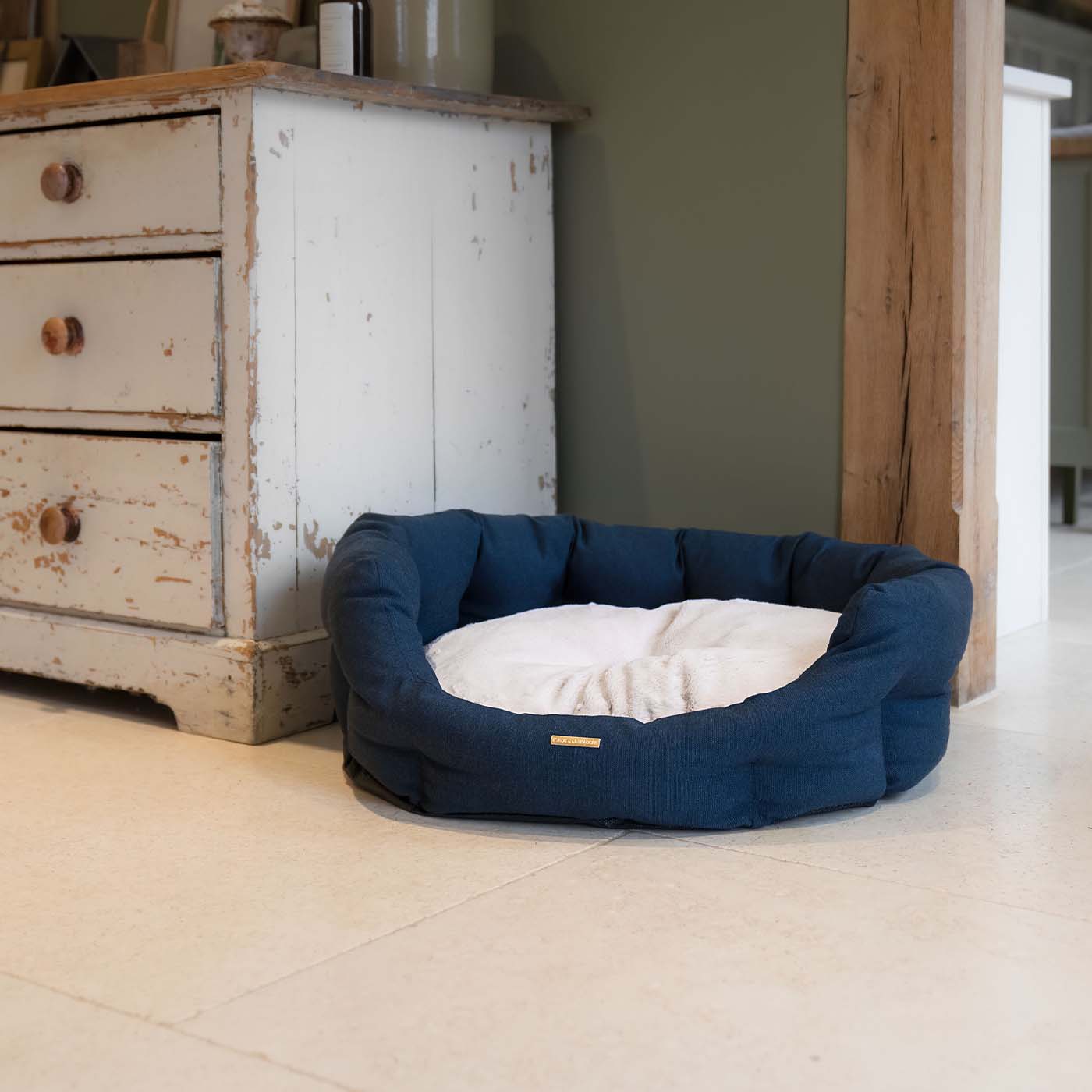 Discover our luxury twill oval dog bed in beautiful Denim, the ideal choice for dogs to enjoy blissful nap-time, featuring reversible inner cushion with raised sides for dogs who love to rest their head for the ultimate cosiness! Handcrafted in Italy for pure pet luxury! Available now at Lords & Labradors 