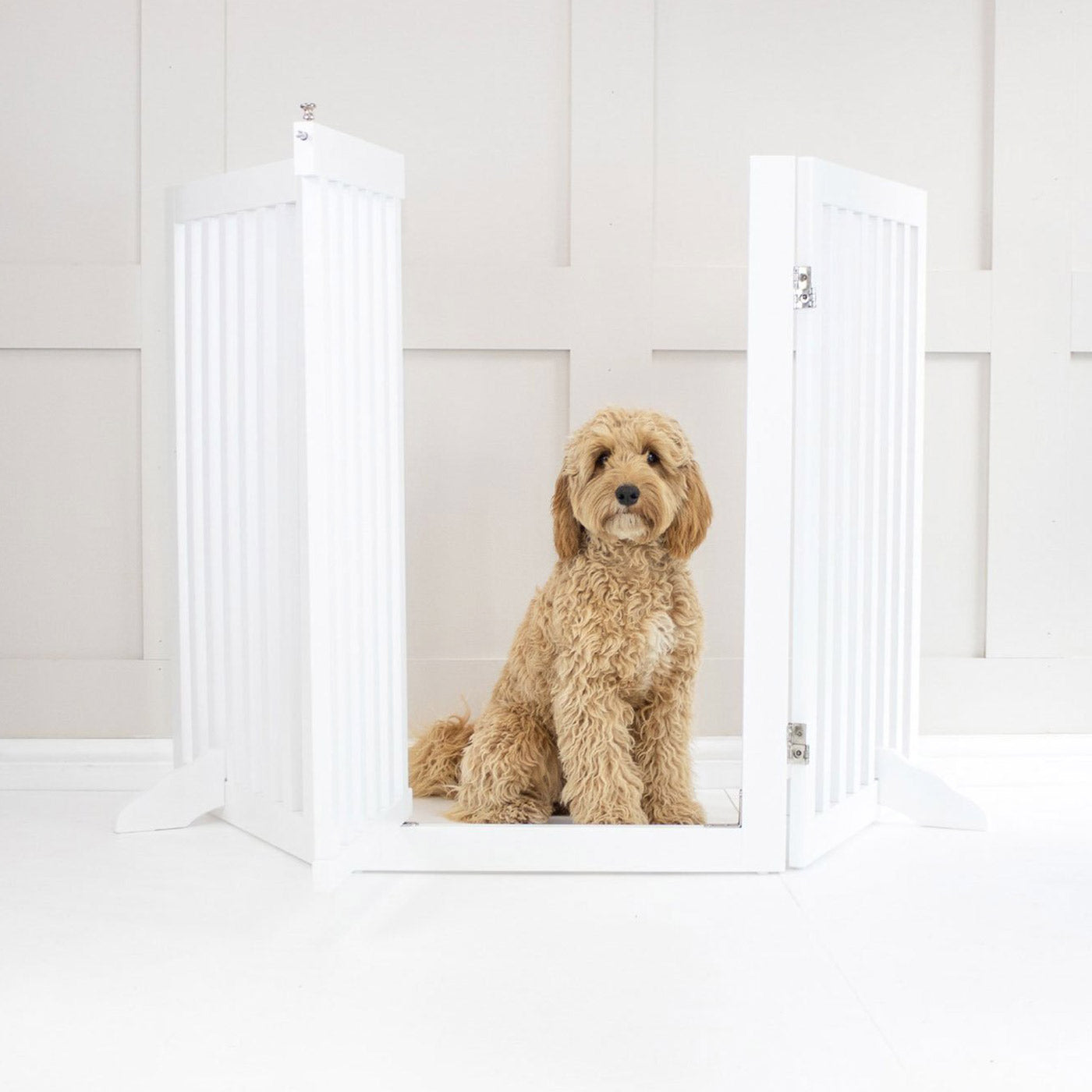 Train your new puppy with the perfect pet furniture, our super-strong wooden dog gate will ensure you set the boundaries for your furry friend, made easy to assemble featuring a walk-through gate for easy accessibility to be installed in doorways, hallways and stairs! Shop the ideal pet gate, available now in white & grey at Lords & Labradors     